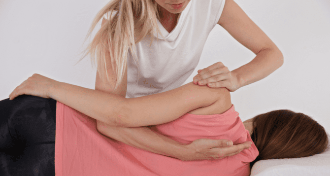Woman undergoing manipulative treatment